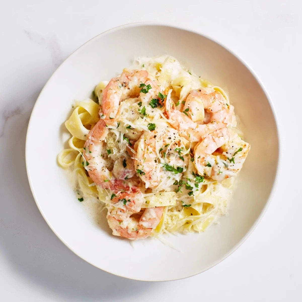 Instant Pot Shrimp Alfredo Pasta, creamy and decadent, served with fresh parsley garnish.