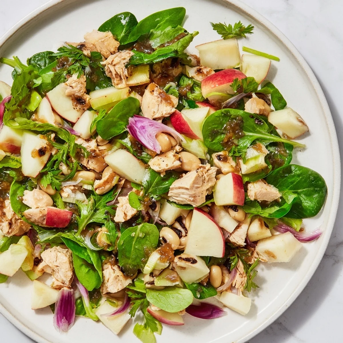 Chicken and Apple New Years Luck Salad, bursting with fresh apples, ready to celebrate the New Year.