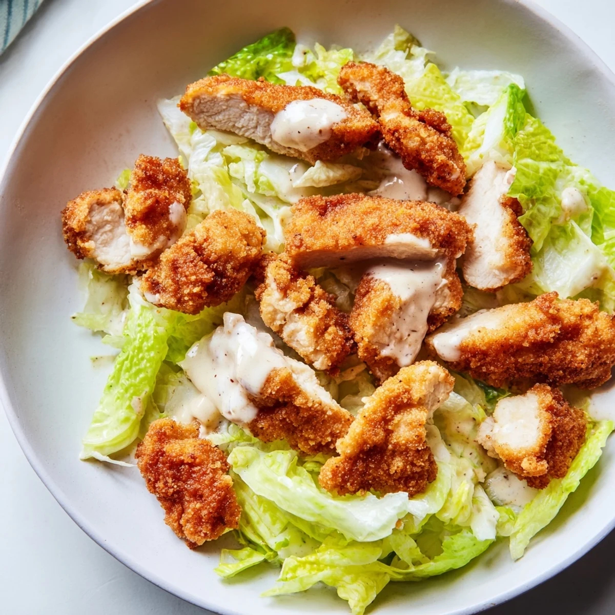 Perfectly assembled honey mustard chicken wrap, ready to serve with juicy tomatoes and red onion.