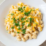 Creamy, veggie-packed one-pot butternut squash mac & cheese, topped with fresh parsley for serving.