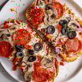 Homemade Air Fryer Pizza Toast loaded with melted mozzarella and pepperoni, ready to enjoy as a snack!