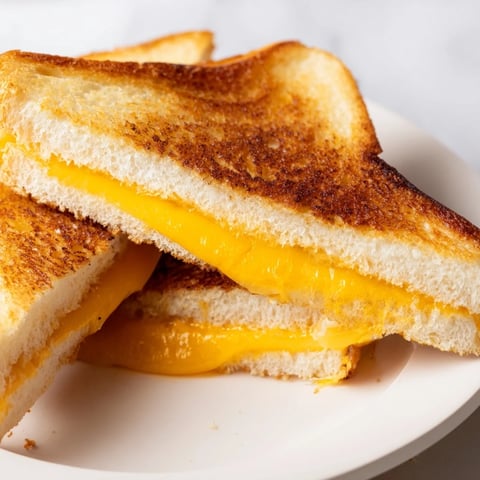 Golden, crispy air fryer grilled cheese; the perfect comfort food ready in minutes for lunch.