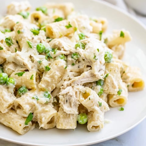 Slow Cooker Chicken Alfredo Pasta Bake: creamy, bubbling, and perfect for a cozy weeknight dinner.