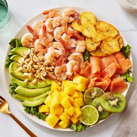 A beautifully arranged Tropical Wave Tasting Platter featuring fresh fruit, seafood, and crispy plantain chips.