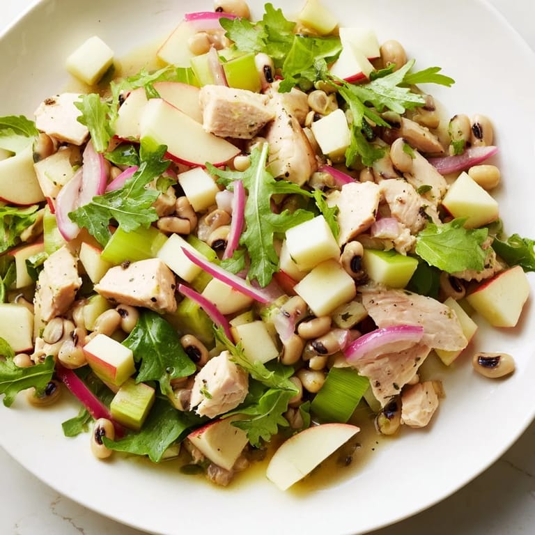Bright, colorful Chicken and Apple New Years Luck Salad features tender chicken over mixed greens for good luck.